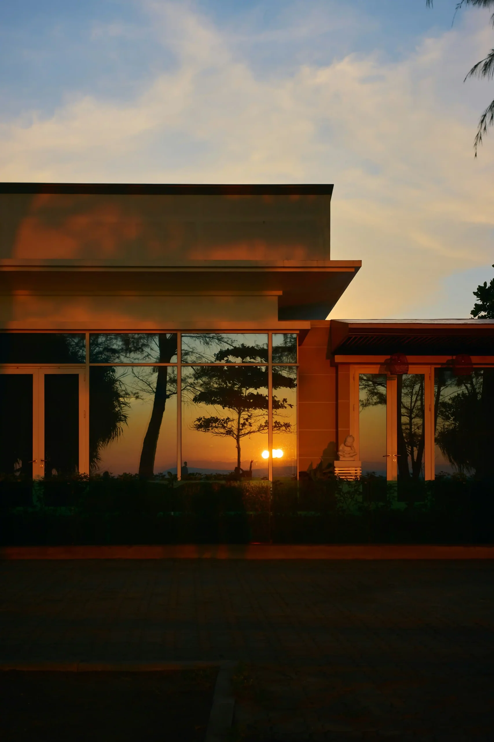 Luxury coastal property at sunset